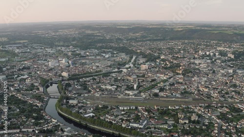 Wallpaper Mural Drone Aerial shot of Montluçon in central France. Montlucon is the largest commune in the Allier department and belongs to the Auvergne-Rhône-Alpes region. A panorama of the french city at sunset. Torontodigital.ca