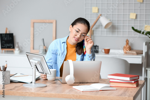 Female student studying onl...