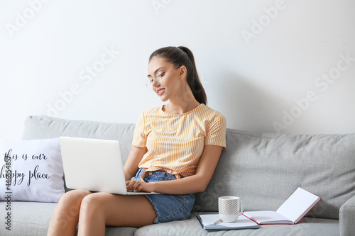 Female student studying onl...
