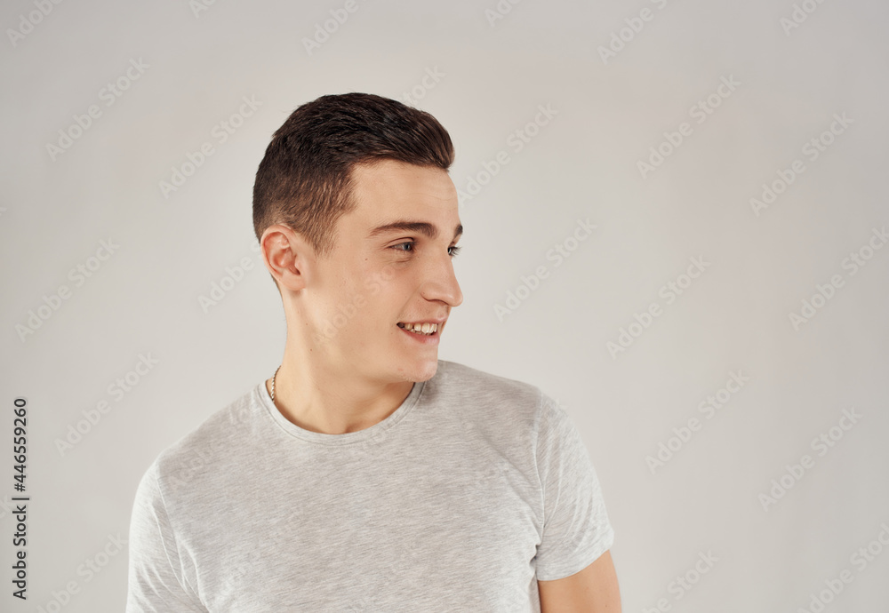 Cheerful man holding his head cropped view studio isolated fund emotions
