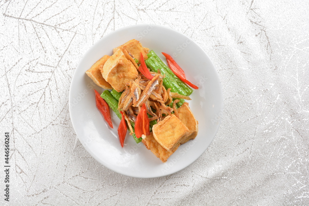 stir fried mixed vegetables with bean curd tofu, long bean and silver fish asian halal snack menu stir fried mixed vegetables with bean curd tofu, long bean and silver fish asian halal snack menu