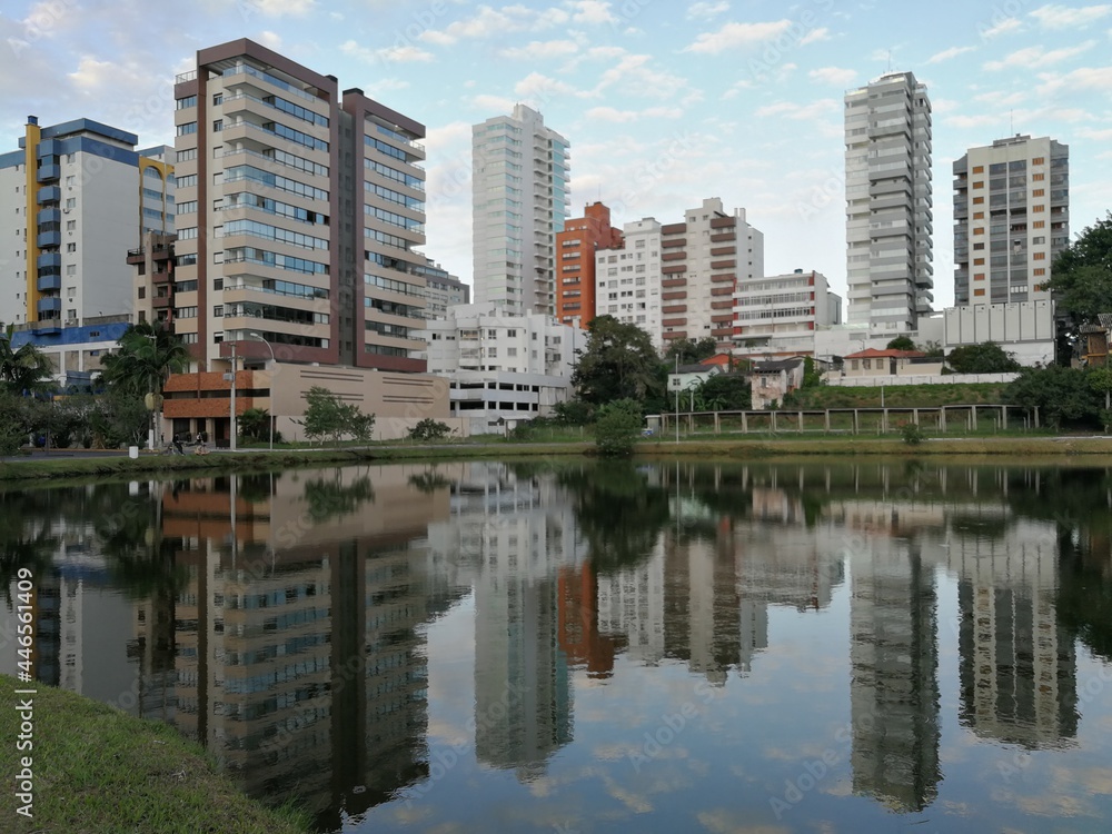 buildings and reflections in the river
