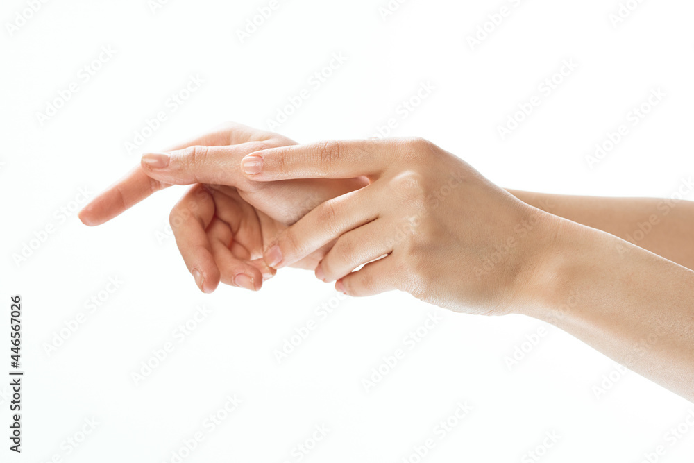 hands cream massage skin care close-up health light background hands cream massage skin care close-up health light background