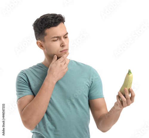 Thoughtful young man with f...