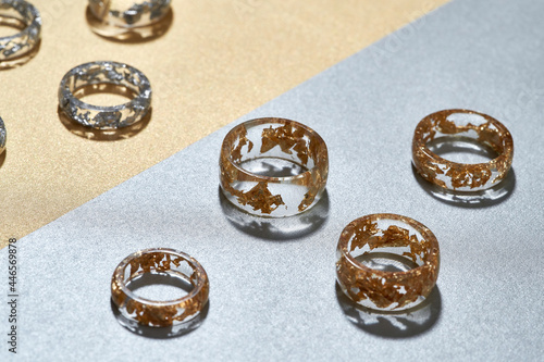 Studio shot of clear acrylic rings with golden filling