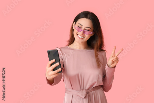 Stylish young Asian woman t...
