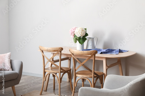 Vase with hydrangea flowers on table in room © Pixel-Shot