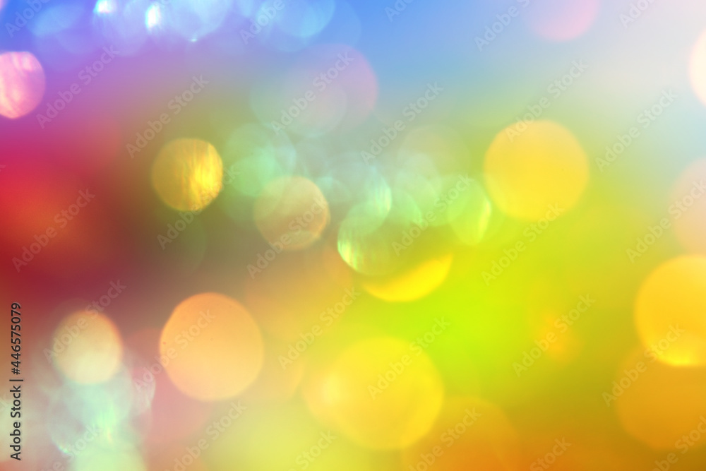 Obraz premium Colored defocused background with glowing bokeh. Summer background.