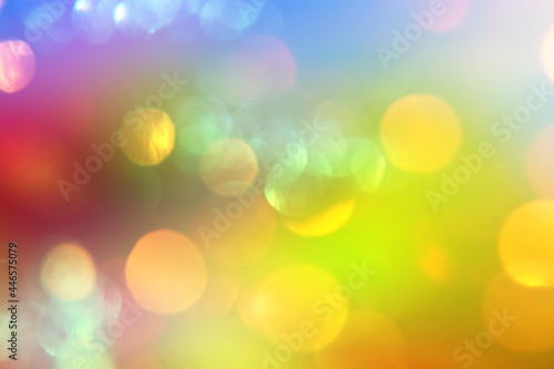 Colored defocused background with glowing bokeh. Summer background.