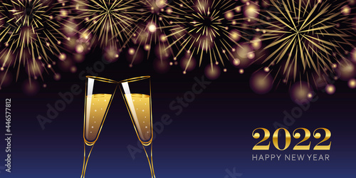 happy new year 2022 golden firework and champagne glasses greeting card