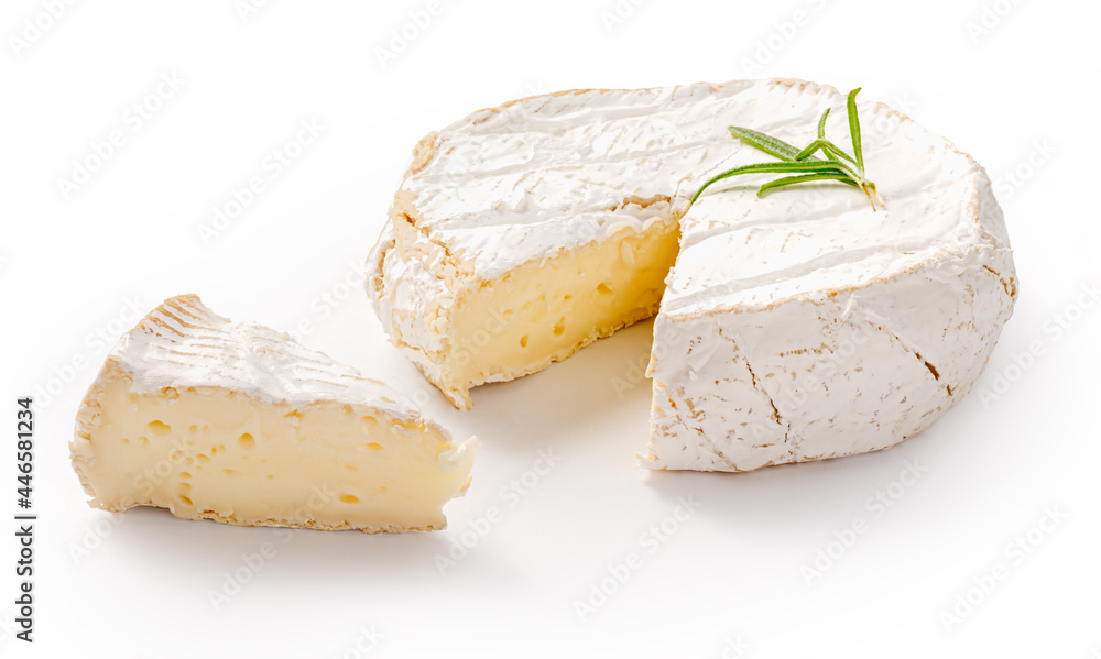 Fresh camembert cheese with sliced camembert isolated. Camembert cheese piece with rosemary on white background.