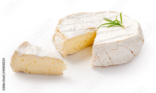 Fresh camembert cheese with sliced camembert isolated. Camembert cheese piece with rosemary on white background.