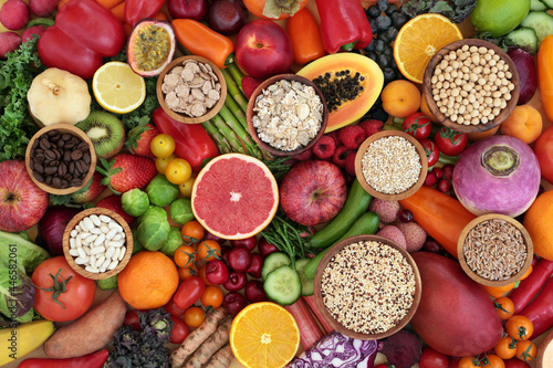 Antioxidant health food to lower cholesterol and blood pressure with fruit, vegetables, cereals, legumes, grains, high in fibre, anthocyanins, lycopenes, carotenoids, vitamins, minerals. Flat lay.