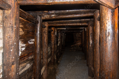Wooden timbering tunnel in old abandoned gold mine