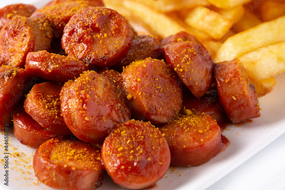 Traditional German currywurst. Close up. Suasages with ketchup and curry