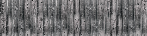 Seamless background texture of old white painted wooden lining boards wall. Bright natural wood texture surface  seamless background