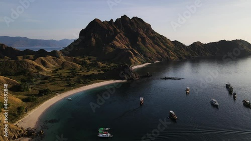 Boats Sailing At The Coast Of Padar Island In Komodo Archipelago In East Nusa Tenggara, Indonesia. aerial photo