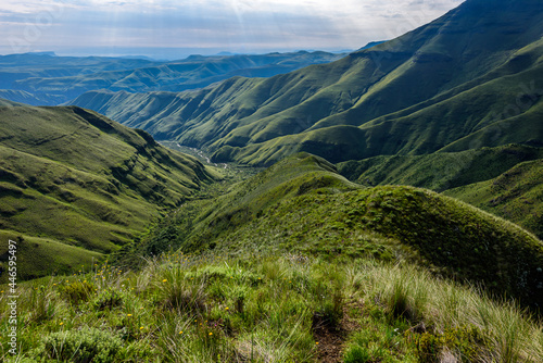 The Drakensberg is the eastern portion of the Great Escarpment  which encloses the central Southern African plateau.