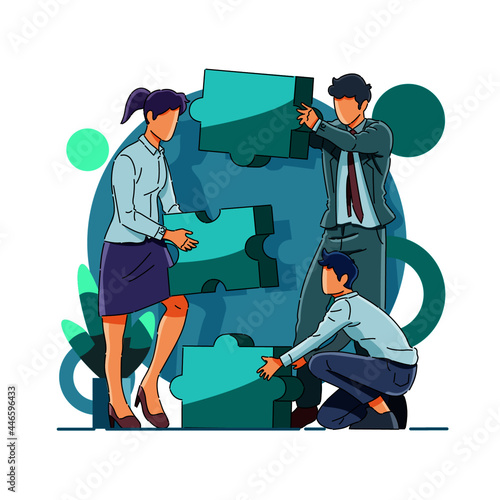 business team putting together jigsaw puzzle