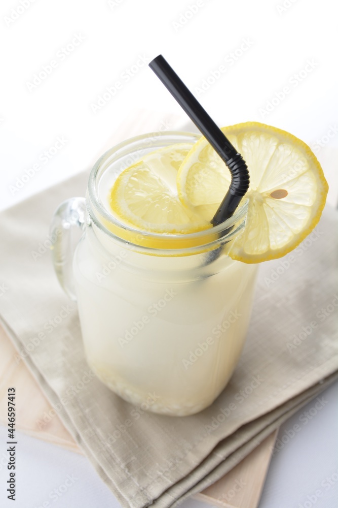 cold iced lemon barley juice with lemon in glass jar white background asian beverage halal menu cold iced lemon barley juice with lemon in glass jar white background asian beverage halal menu