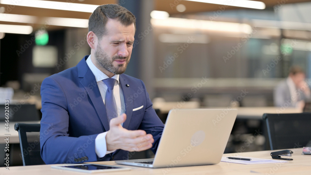 Middle Aged Businessman with Laptop having Loss, Failure