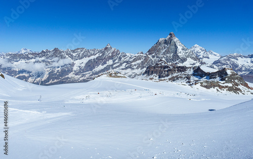 The matterhorn: one of the most iconic and famous mountains in the Alps. The Cima is surrounded by glaciers, rock faces and fantastic landscapes near the town of Cervinia, Italy - June 2021 photo