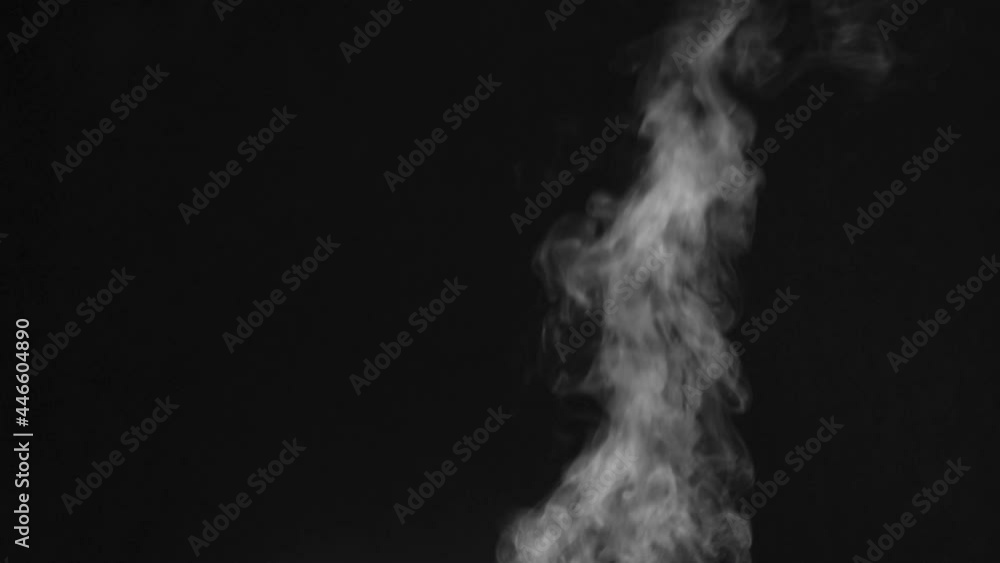 Water Vapor Jet Loses its Intensity. White steam rises gracefully in an active trickle from a cup of brewed coffee, which is located off-screen. Filmed at a speed of 120fps Water Vapor Jet Loses its Intensity. White steam rises gracefully in an active trickle from a cup of brewed coffee, which is located off-screen. Filmed at a speed of 120fps