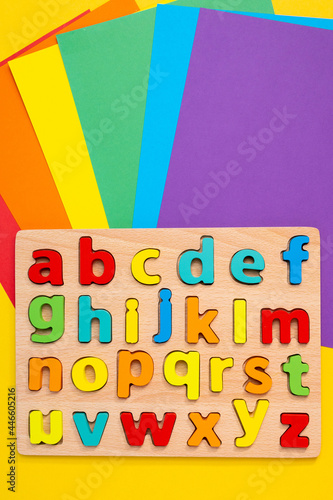 English alphabet on a colorful background top view.