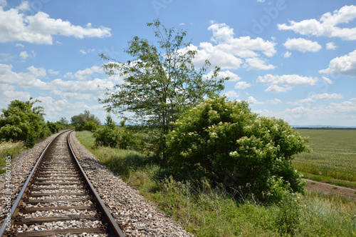 single railroad in rural landscape in Vojvodina © Jana