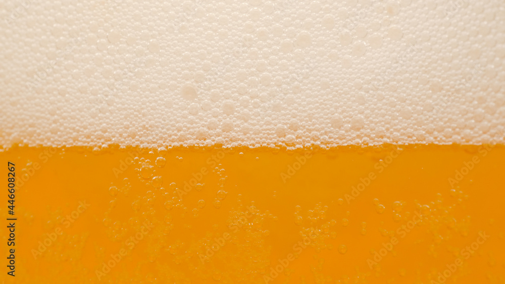 Beer Bubbles - Alcohol Ale Brew Foam - Foaming Soda Drink - Close Up Beer Bubbles - Alcohol Ale Brew Foam - Foaming Soda Drink - Close Up