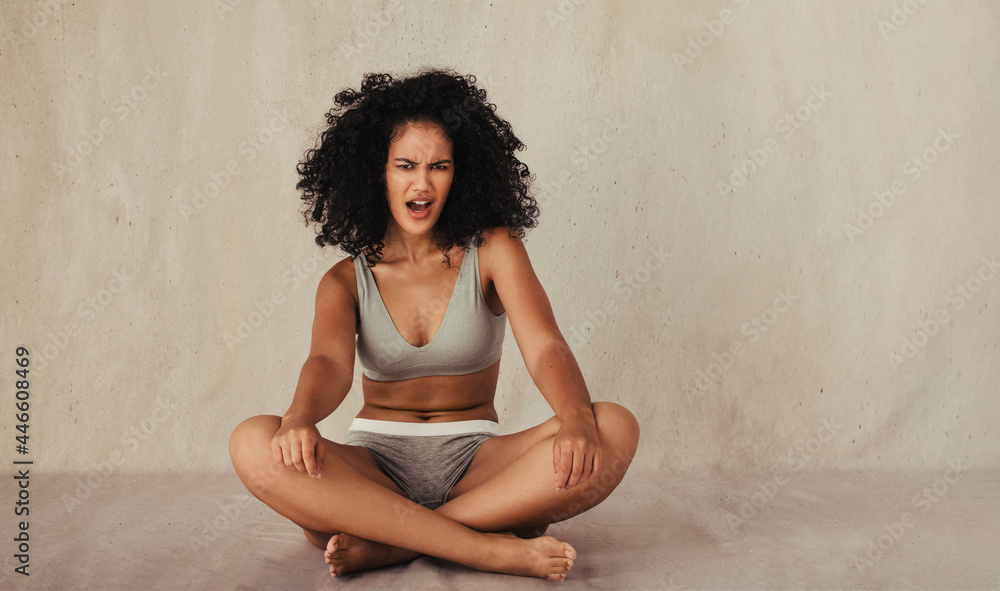 Portrait of a confident woman posing in her natural body Portrait of a confident woman posing in her natural body