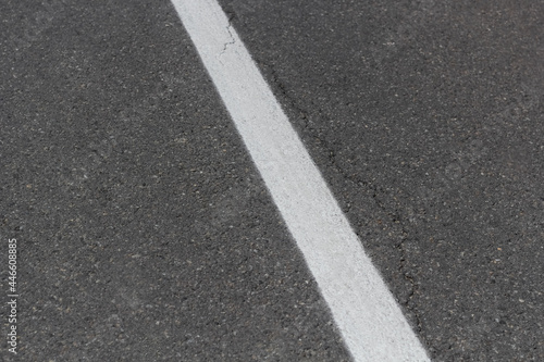 White line and asphalt road. White line on the asphalt road.