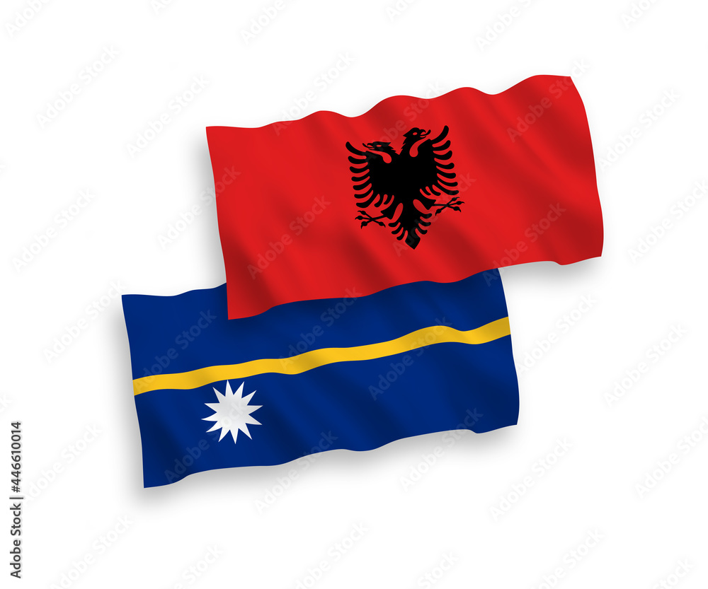 National vector fabric wave flags of Republic of Nauru and Albania isolated on white background. 1 to 2 proportion.