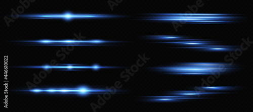 Blue horizontal lens flares pack. Laser beams, horizontal light rays. Beautiful light flares. Glowing streaks on dark background.