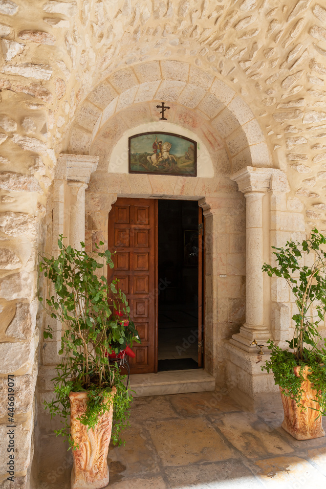 Entrance  from the courtyard to the small monastery of St. George on the border of the Jewish and Armenian quarters in the old city of Jerusalem, Israel