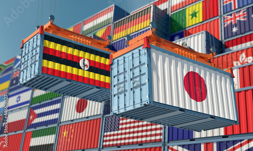 Freight containers with Uganda and Japan flag. 3D Rendering 