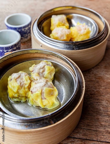 Chinese breakfast dumplings stuffed with crab in a wooden container