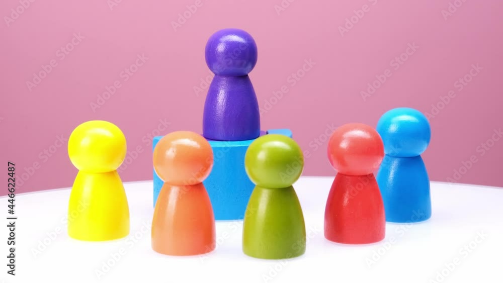 business meeting and social networking concept. Wooden figures of people. the speaker gives explanations to people. 4k video business meeting and social networking concept. Wooden figures of people. the speaker gives explanations to people. 4k video