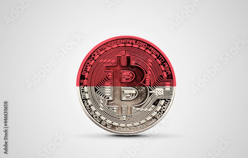 Indonesia flag on a bitcoin cryptocurrency coin. 3D Rendering