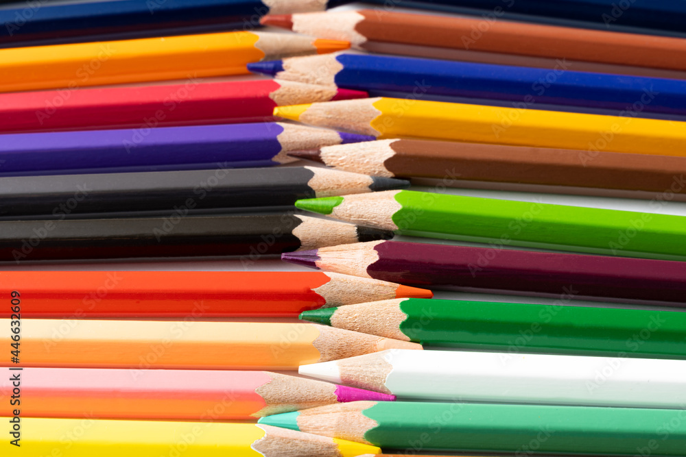 Colorful pencils on red background.Pencil background, Education concept and back to school concept.Top view Colorful pencils on red background.Pencil background, Education concept and back to school concept.Top view