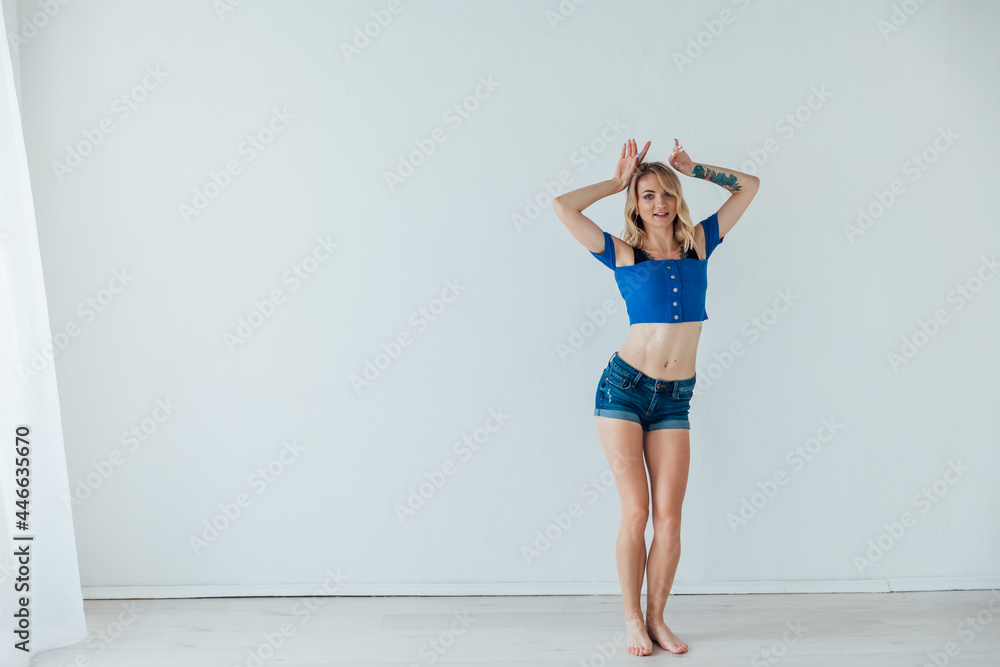 blonde woman dancing to music in training blonde woman dancing to music in training