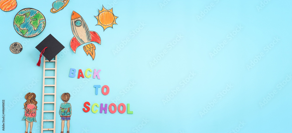Back to school concept. Top view image of two kids standing next to wooden ladder over blue background Back to school concept. Top view image of two kids standing next to wooden ladder over blue background