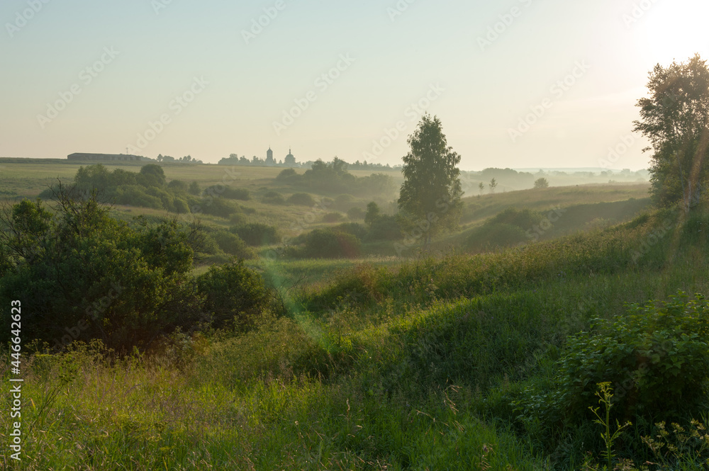 Obraz premium Morning in the Russian outback. A church is on the horizon