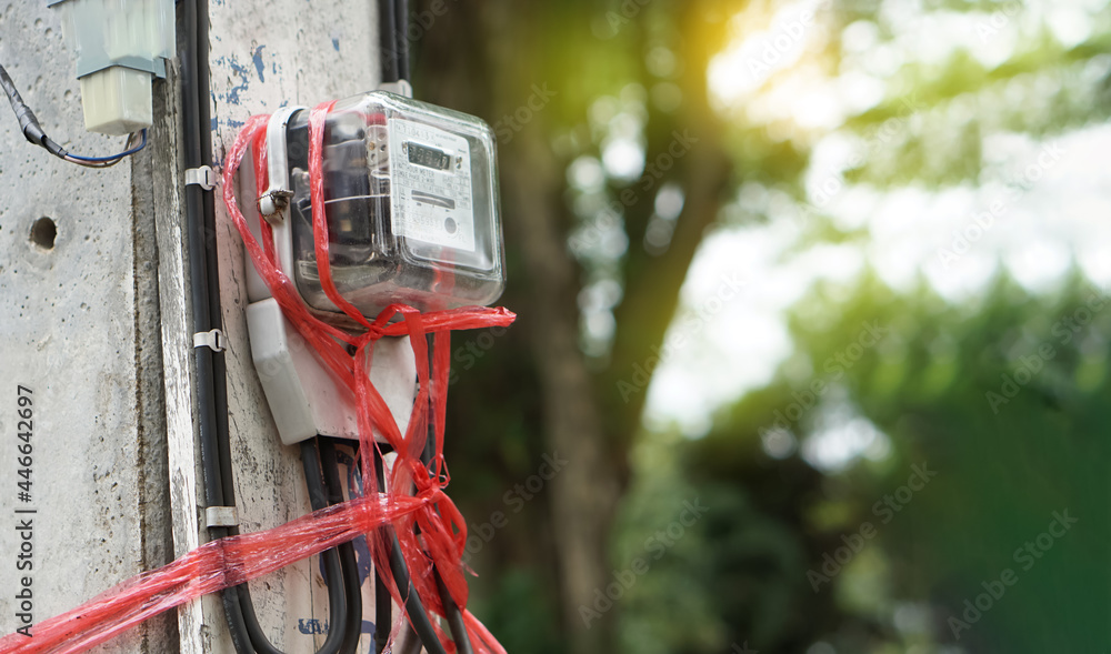 Concept : unsafe electricity fixing. Red plastic rope is used to tie ...