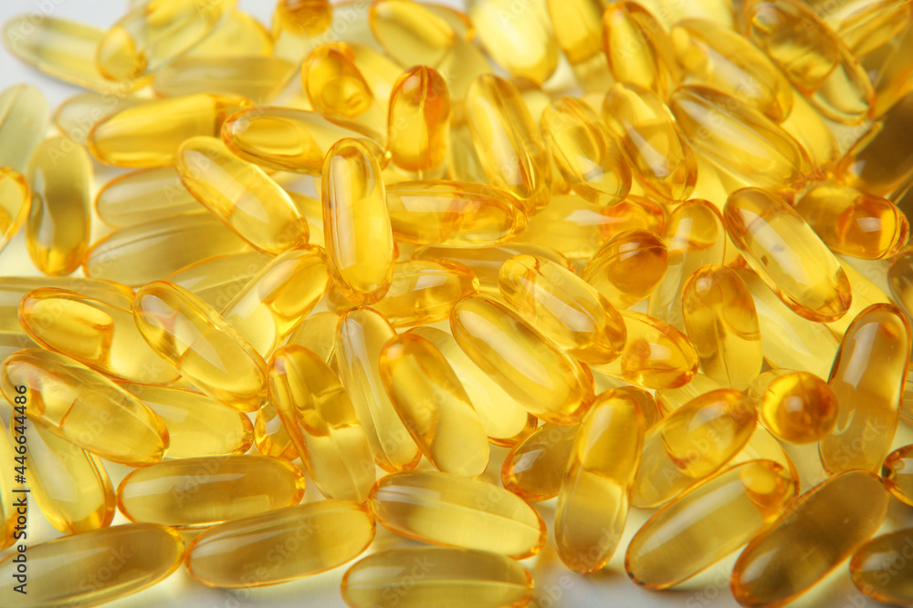 Omega 3 capsules close up. Fish fat. Background Omega 3 capsules close up. Fish fat. Background