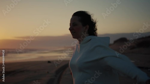 4k resolution. Woman looking view at ocean. Young beautiful girl meditating on coast ocean. Shot on bmpcc 6k.