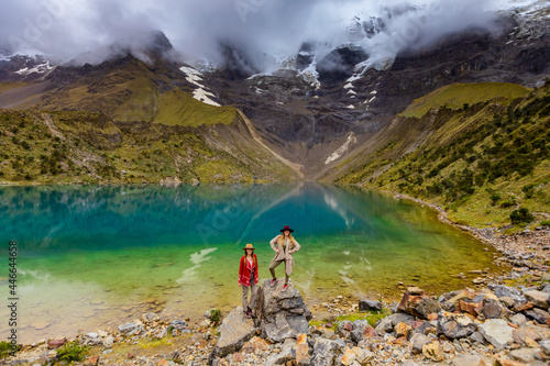 Two woman trekking Humantay Lake, Cusco, Peru photo