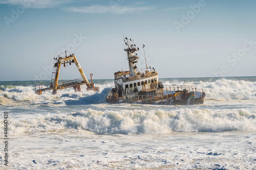 Waves crashing on Zeila Shipwreck on the Skeleton Coast in Namibia, Africa.	
 photo