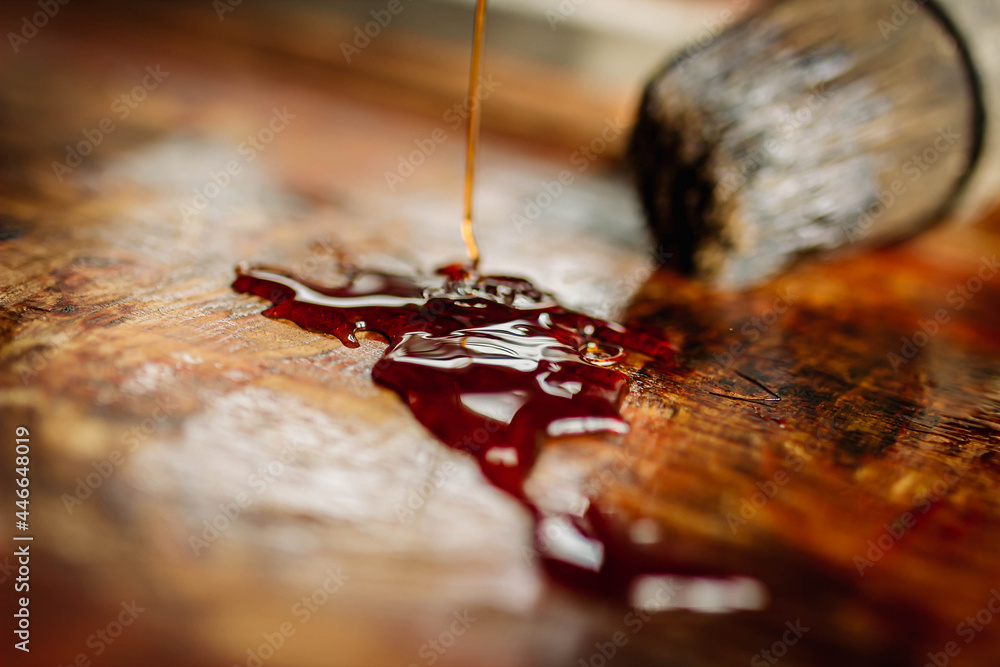 Wood treatment with epoxy varnish, surface restoration. Elm wood table with epoxy resin. The table top is made of wood. Woodworking, joinery, furniture manufacturing.