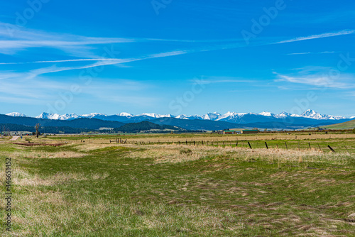 Landscape of the Flint Cheek Valley in Montana with the Snow-Capped Anaconda Mountain Range in the Background